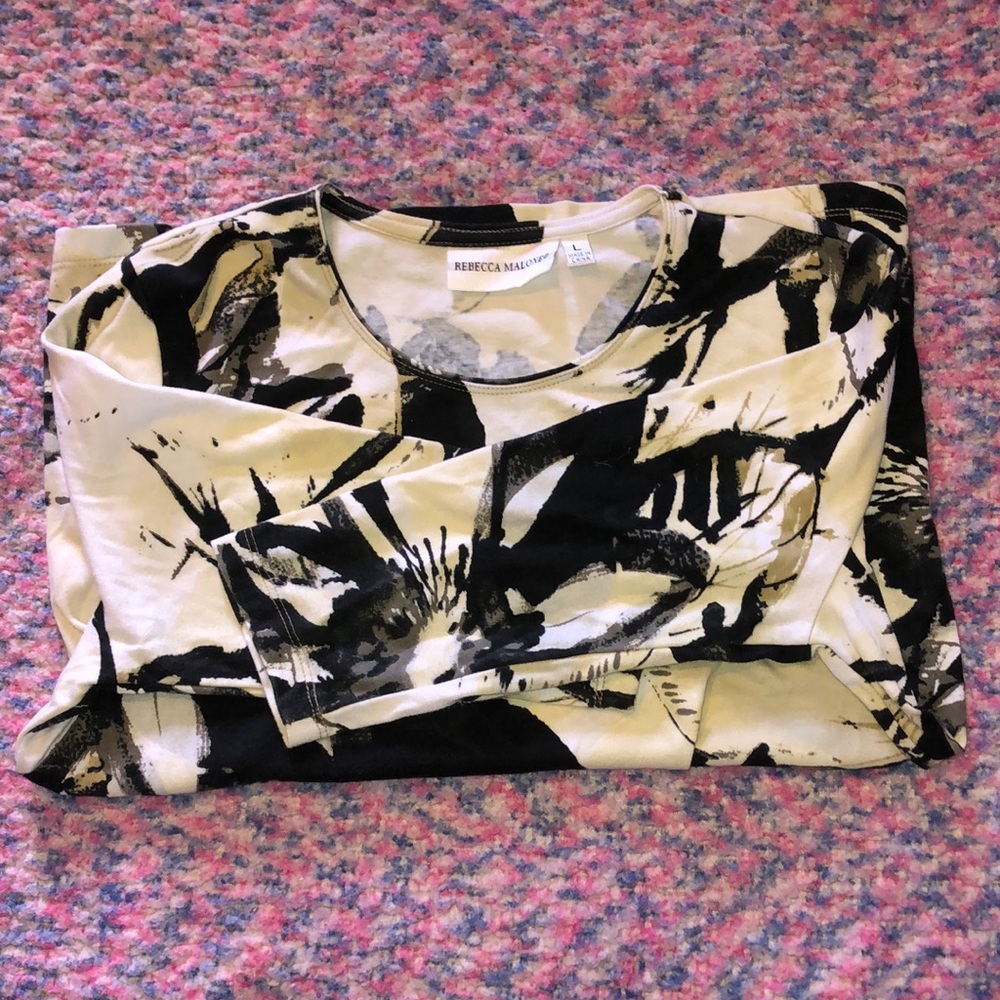 L white shirt with grey/black flowers